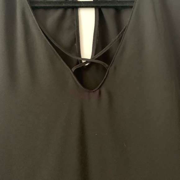 Flowy black blouse with criss cross top and bell sleeves - Picture 3 of 3